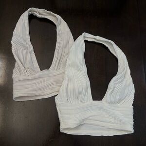 two (or one) cream/white halter tops